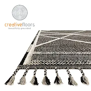 VAM-02-BC-CORNER Colorful woven rug with tassels, ideal for home decor and stylish flooring.