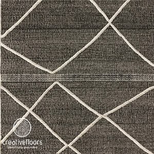 Elegant dark gray carpet with white geometric pattern for modern flooring design.