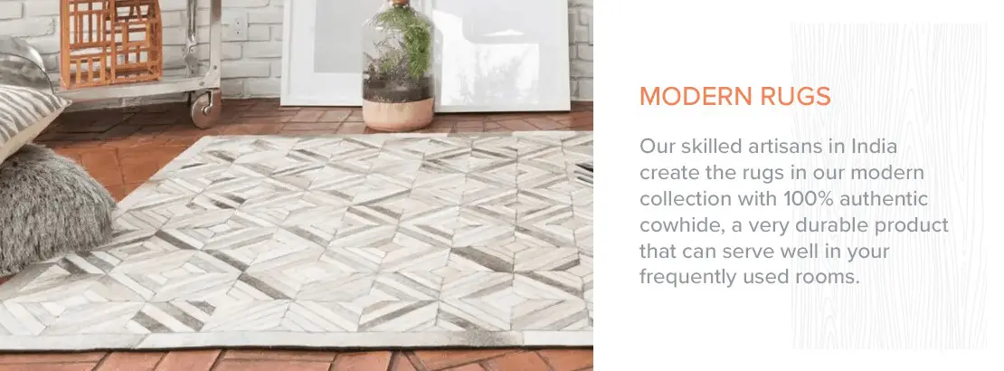 Cream and grey modern cowhide rug with geometric pattern for contemporary interiors.