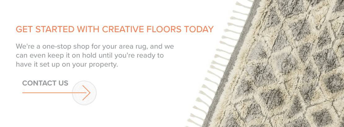 Luxury textured area rug with soft neutral tones for home decor.