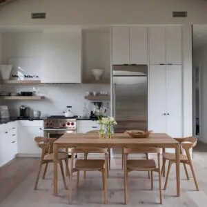 Wooden kitchen flooring, modern white kitchen, natural hardwood floors, sleek kitchen interior, Creative Floors wood flooring.