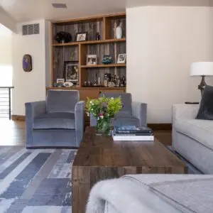 Cozy living room with stylish hardwood flooring, modern furniture, and decorative accents.