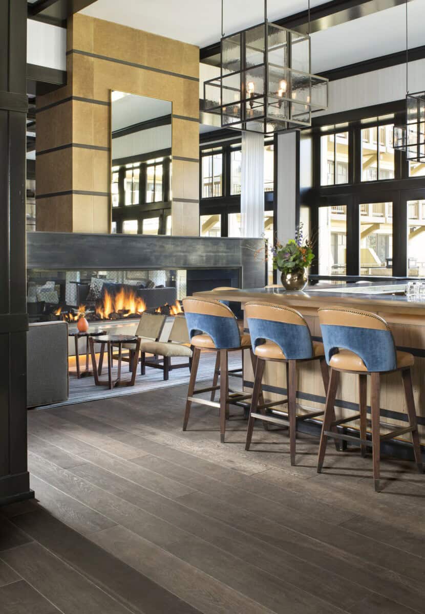 Sustainable hardwood flooring in a modern hotel lobby.