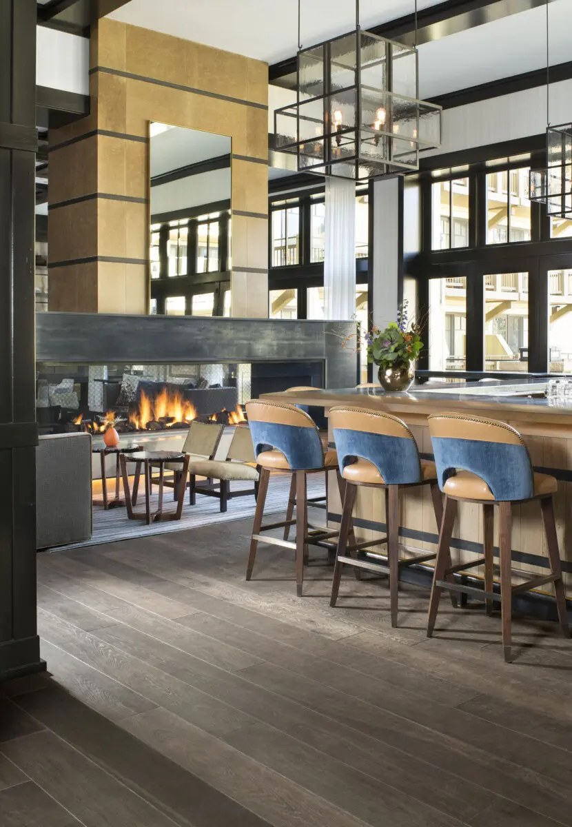Sustainable hardwood flooring in a modern hotel lobby.