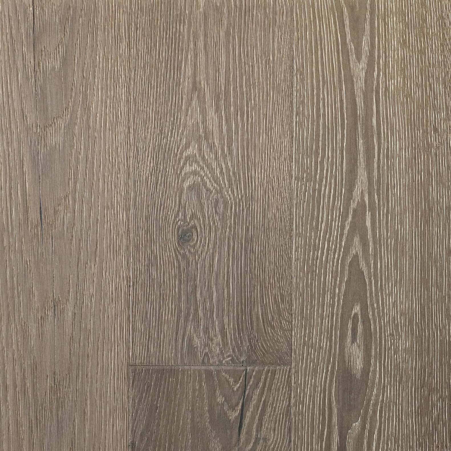 Smooth oak hardwood flooring with natural wood grain texture, ideal for modern interior design.
