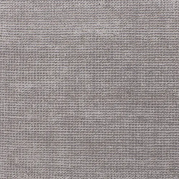 Gray textured carpet flooring with a subtle pattern, ideal for modern interior designs.