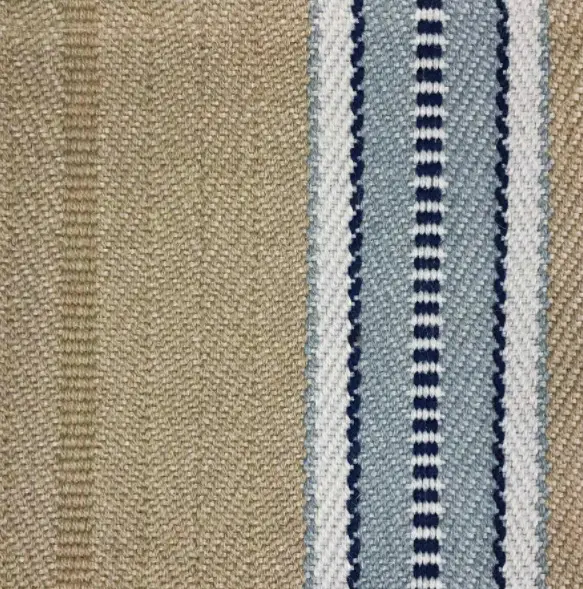 Soft beige carpet texture with blue and white striped pattern, ideal for custom residential flooring solutions.