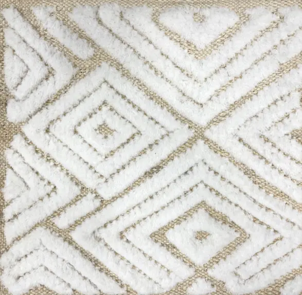 Luxurious white and beige geometric textured rug for modern living spaces.