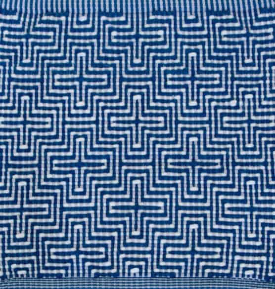 Vibrant blue geometric patterned carpet for stylish interior flooring solutions.