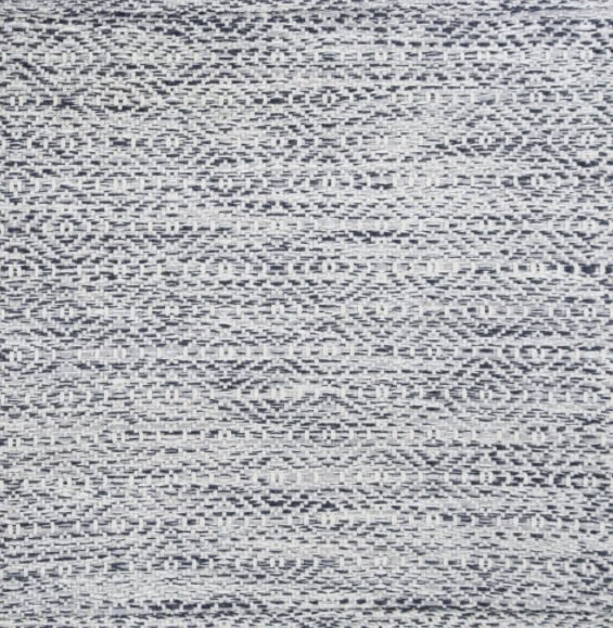 Soft woven area rug with intricate geometric pattern for modern home decor.