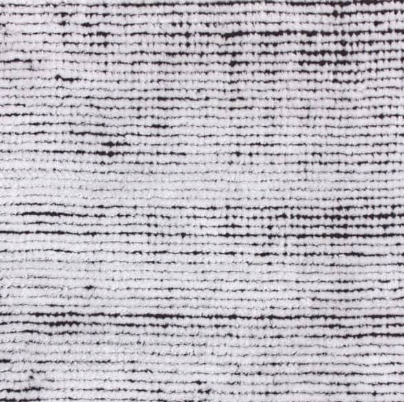 Soft beige and black textured rug with subtle stripes, perfect for modern home decor and flooring upgrades.