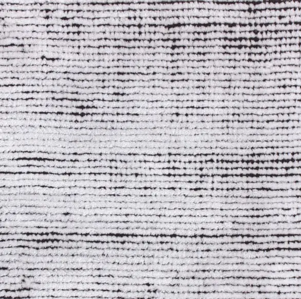 Soft beige and black textured rug with subtle stripes, perfect for modern home decor and flooring upgrades.