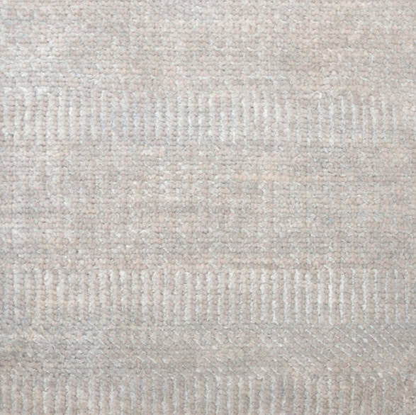 Cream-colored textured area rug with subtle geometric pattern, ideal for interior flooring, providing style and comfort.