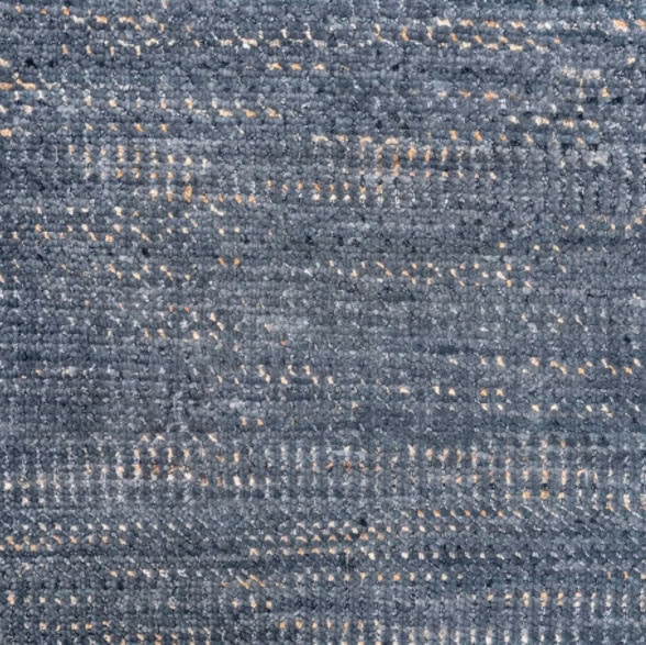 Soft blue patterned carpet with subtle gold accents, ideal for upscale residential or commercial flooring.