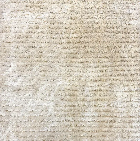 Yannick - AHC-CW-06 Soft, plush beige shag carpet for luxurious flooring and home décor.