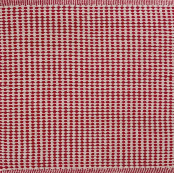 Red and white patterned carpet with geometric design ideal for residential or commercial flooring.