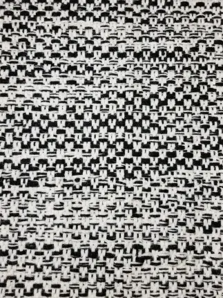 Abbott - LHC-BW-34 Intricate black and white patterned rug with textured weave for stylish flooring.