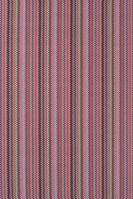 Vibrant multicolored zigzag patterned carpet flooring for interior decor and residential projects.