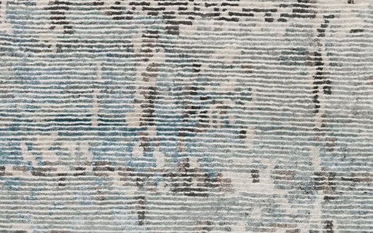 Modern abstract area rug with textured design in neutral tones, perfect for contemporary interior decor.
