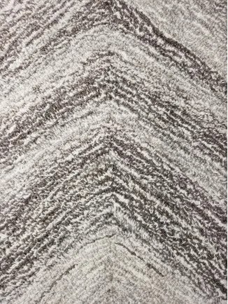 Eason - LLE-BM-02 Textured gray wood-look laminate flooring with a chevron pattern.