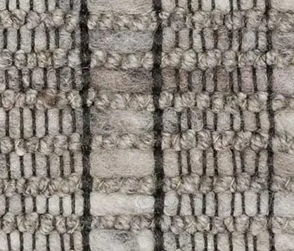 Rug weave pattern showcasing textured neutral beige and gray fibers; ideal for artisanal and contemporary flooring designs.