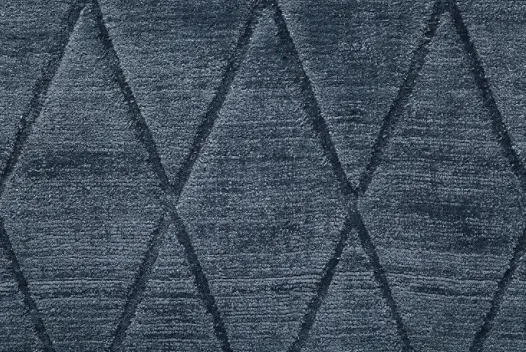 Textured gray geometric patterned carpet for stylish interior flooring.