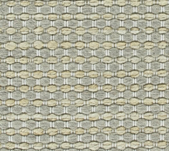 Plush textured carpet sample with beige, gray, and cream tones for modern flooring designs.