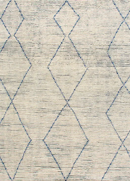 Smooth beige area rug with blue geometric diamond patterns for modern interior design.
