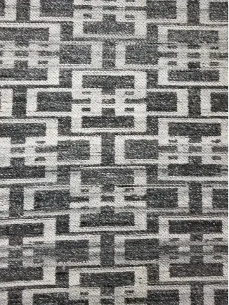 Isla - LLE-DG-09 Intricate modern geometric carpet design in black and white for stylish flooring solutions.