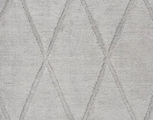 Soft beige textured carpet with subtle geometric diamond pattern, ideal for stylish home flooring.