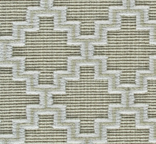 Soft beige textured carpet with geometric pattern, ideal for modern interior flooring.