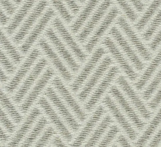 Soft beige herringbone carpet flooring for elegant home interiors or commercial spaces.