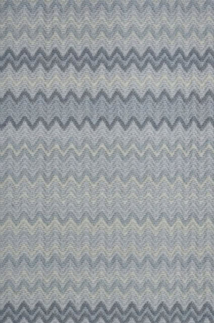 Soft gray and yellow chevron-patterned carpet for custom flooring solutions, ideal for residential and commercial spaces.