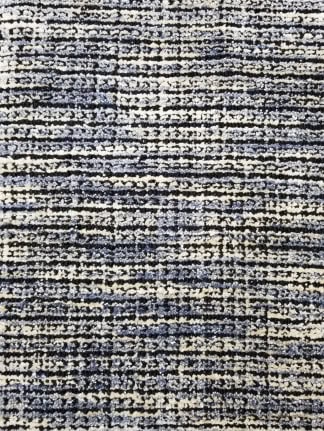 Vibrant abstract area rug with textured design for modern homes and commercial spaces.