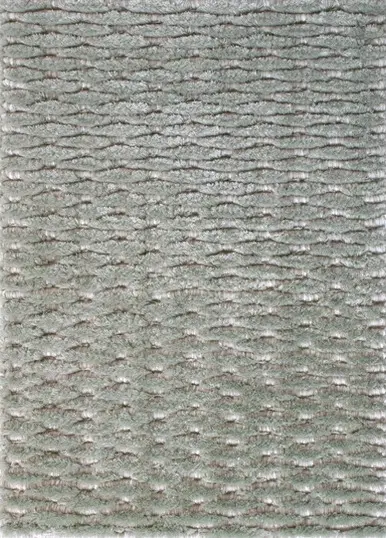 Close-up of textured gray carpet flooring with a contemporary, durable surface.