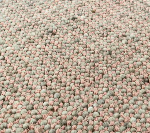 Etta - QAN-CB-04 Colored pebble carpet for interior flooring, soft textured surface with pink and gray tones.