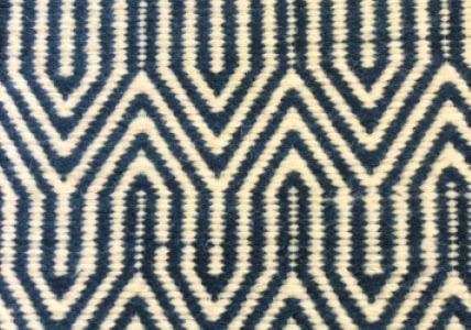 Stylish navy and white patterned area rug for modern home decor and floor design.
