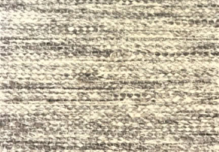 Rustic wood flooring with textured finish for stylish home interior design.