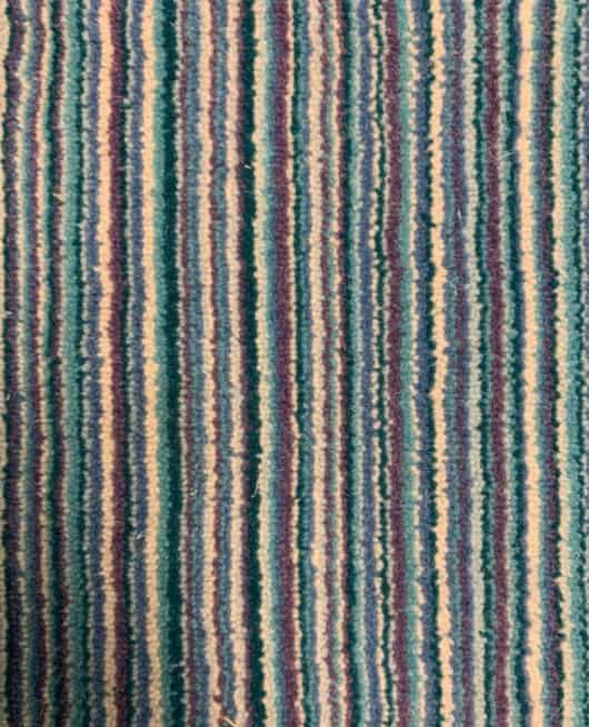 Blue and beige striped carpet with textured pattern for indoor flooring.