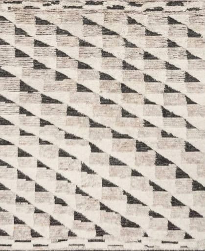 Elegant geometric patterned hardwood flooring in neutral tones for modern interior design.