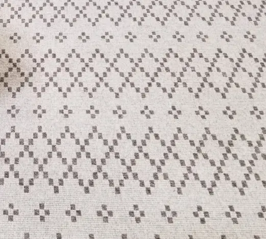 Dalton - UKS-SM-01 Soft beige patterned carpet with geometric design for stylish flooring solutions.