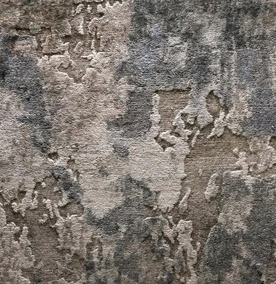 Worn concrete wall with textured surface and peeling paint for interior design.