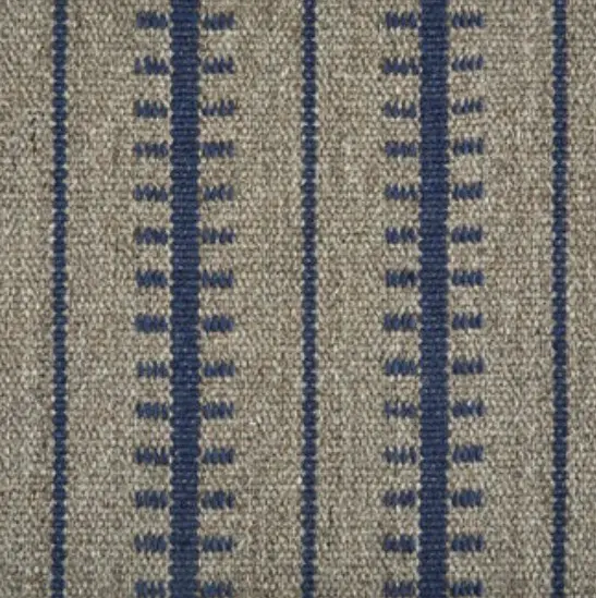 Cream and navy striped area rug with geometric patterns for living rooms and bedrooms.