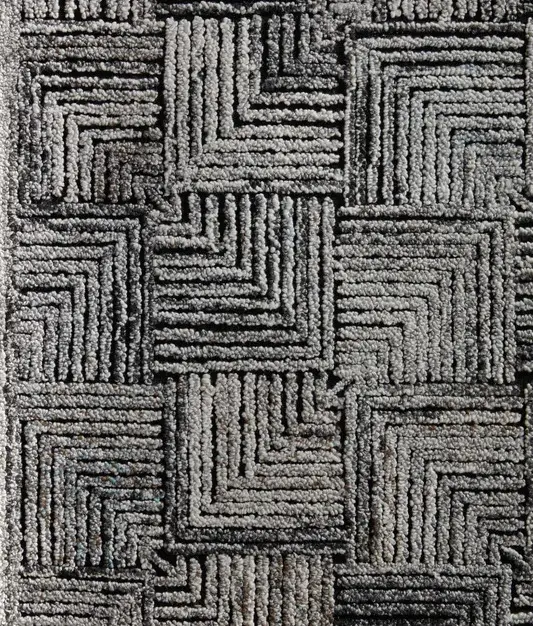 Ines - VPRE-SI-03_D Soft gray textured carpet with geometric pattern, ideal for modern interior flooring and decor.