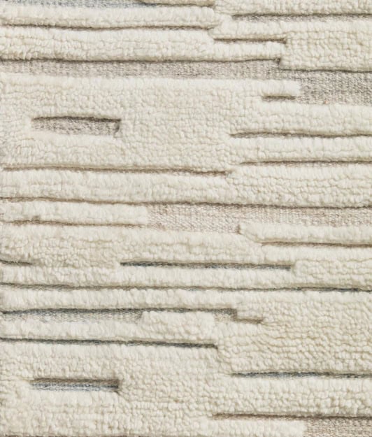 Cream textured modern carpet with linear pattern for stylish flooring.