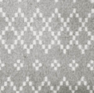 Intricate grey and white patterned carpet showcasing custom flooring designs.
