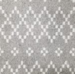 Intricate grey and white patterned carpet showcasing custom flooring designs.