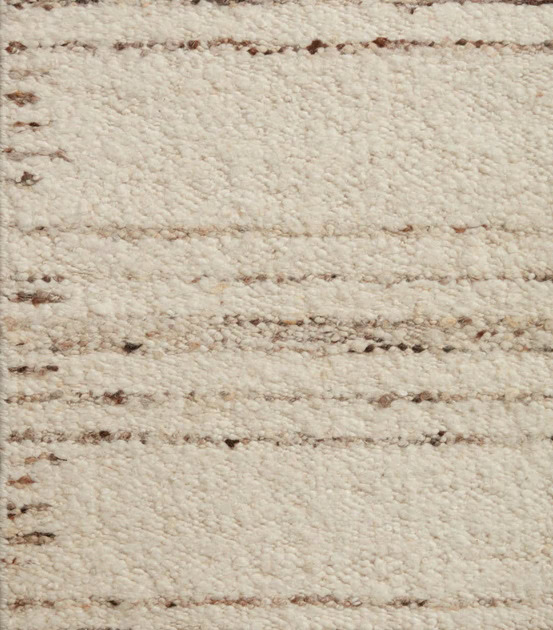 Soft beige plush carpet with textured stripe pattern for luxurious flooring.