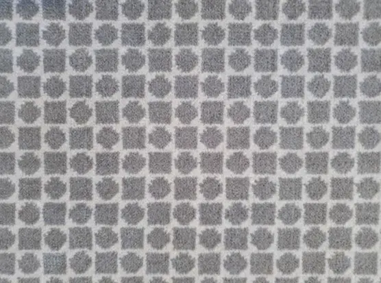 Patterned gray and white tile flooring design for modern interiors.