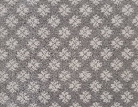 Isa - EFWD-GG-02 Soft gray carpet with white floral pattern, ideal for cozy home flooring and interior decoration.